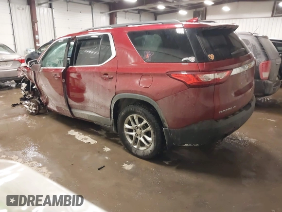 2021 Chevrolet Traverse LT Cloth with VIN 1GNEVGKW8MJ124350, listed as a IAAI auction lot 41456704 with 121,336 mi miles. Bid and sale history available at carsss.com. Image 3.