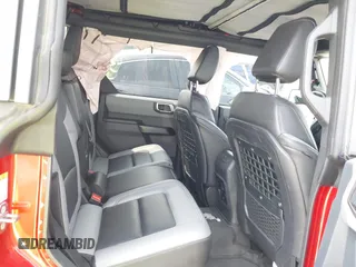 2024 Ford Bronco z VIN 1FMEE1BP8RLA06515, wystawiony jako IAAI lot #42285341 z przebiegiem 17 102 mil mil oraz . Historia ofert i sprzedaży dostępna na DreamBid. Obrazek 8.