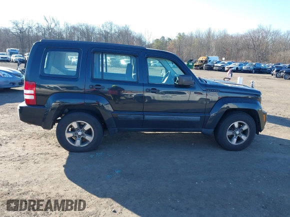 2008 Jeep Liberty Sport with VIN 1J8GN28K38W256670, listed as a IAAI auction lot 41688609 with 147,343 mi miles. Bid and sale history available at carsss.com. Image 13.
