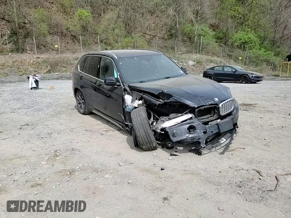 2017 BMW X5 xDrive35i z VIN 5UXKR0C53H0V68419, wystawiony jako Copart lot #54097345 z przebiegiem 100 682 mil mil oraz Szkoda całkowita • Salvage title. Historia ofert i sprzedaży dostępna na DreamBid. Obrazek 14.