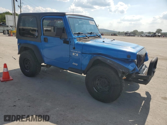 2002 Jeep Wrangler X with VIN 1J4FA39S92P776435, listed as a Copart auction lot 62792235 with 182,385 mi miles and Salvage title. Bid and sale history available at DreamBid. Image 4.