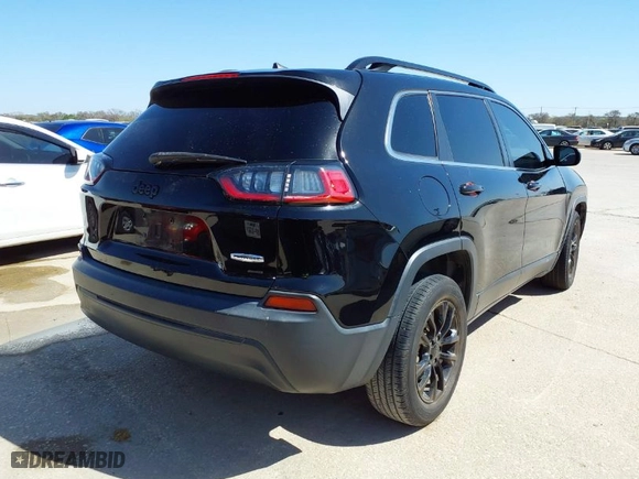 2019 Jeep Cherokee Latitude Plus with VIN 1C4PJLLBXKD176124, listed as a IAAI auction lot 41851150 with 90,101 mi miles. Bid and sale history available at carsss.com. Image 4.