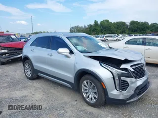 2020 Cadillac XT4 AWD Premium Luxury with VIN 1GYFZDR46LF038051, listed as a IAAI auction lot 40173243 with 67,210 mi miles and . Bid and sale history available at DreamBid. Image 1.