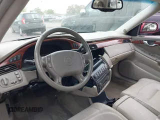 2002 Cadillac DeVille with VIN 1G6KD57YX2U257123, listed as a IAAI auction lot 41952025 with 180,278 mi miles. Bid and sale history available at carsss.com. Image 17.