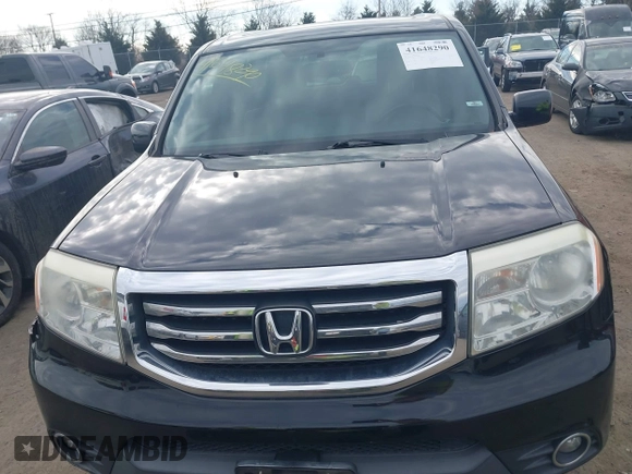 2013 Honda Pilot EX-L with VIN 5FNYF4H77DB047995, listed as a IAAI auction lot 41648290 with 154,926 mi miles and . Bid and sale history available at DreamBid. Image 12.
