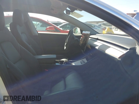 2020 Tesla Model 3 Long Range with VIN 5YJ3E1EB4LF619026, listed as a IAAI auction lot 41796901 with Not Provided miles and . Bid and sale history available at DreamBid. Image 5.