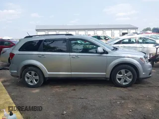 2012 Dodge Journey SXT with VIN 3C4PDDBG1CT323727, listed as a IAAI auction lot 42473238 with 77,035 mi miles and . Bid and sale history available at DreamBid. Image 13.