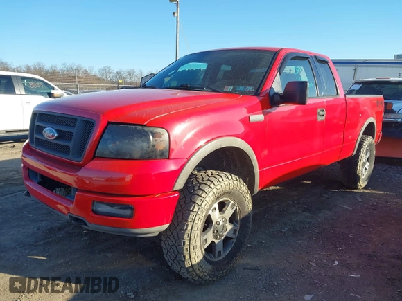 2004 Ford F-150 XLT with VIN 1FTPX14524NA28252, listed as a IAAI auction lot 41753719 with 165,179 mi miles. Bid and sale history available at carsss.com. Image 2.