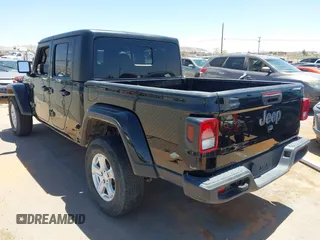 2023 Jeep Gladiator Overland z VIN 1C6HJTFG0PL564298, wystawiony jako IAAI lot #42149117 z przebiegiem 65 416 mil mil oraz . Historia ofert i sprzedaży dostępna na DreamBid. Obrazek 3.