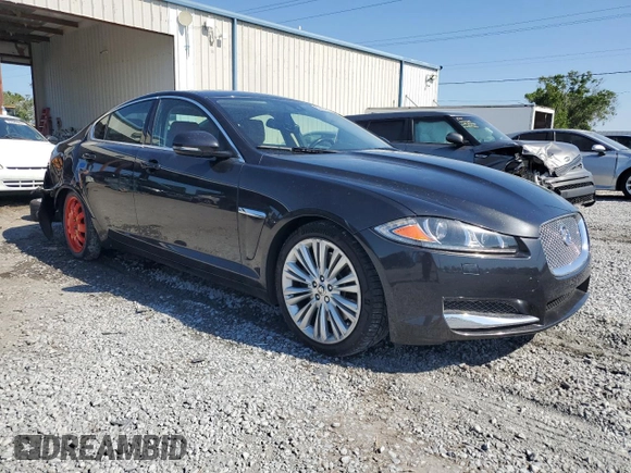 2012 Jaguar XF Portfolio with VIN SAJWA0HB4CLS35664, listed as a Copart auction lot 53427265 with 98,731 mi miles and Salvage Title. Bid and sale history available at carsss.com. Image 4.