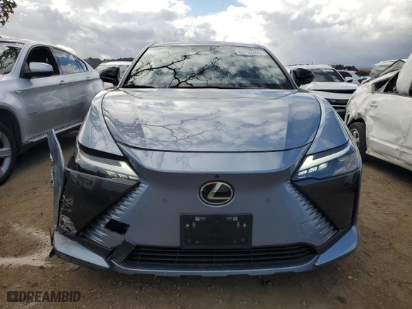 2023 Lexus RZ with VIN JTJAAAAB1PA005958, listed as a Copart auction lot 80736244 with 21,413 mi miles and Salvage Title. Bid and sale history available at carsss.com. Image 5.