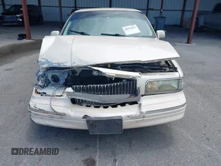 1996 Lincoln Town Car Cartier with VIN 1LNLM83W7TY634343, listed as a IAAI auction lot 42474123 with 193,705 mi miles and . Bid and sale history available at DreamBid. Image 12.
