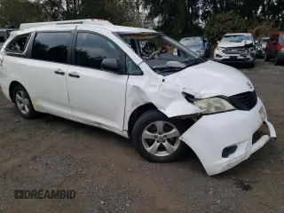 2014 Toyota Sienna L with VIN 5TDZK3DC8ES520037, listed as a Copart auction lot 54092715 with Not provided miles and Salvage title. Bid and sale history available at DreamBid. Image 4.