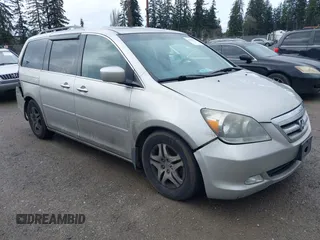 2007 Honda Odyssey EX-L z VIN 5FNRL38797B076409, wystawiony jako IAAI lot #41862624 z przebiegiem 225 205 mil mil oraz . Historia ofert i sprzedaży dostępna na DreamBid. Obrazek 1.