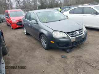 2006 Volkswagen Jetta Sedan 2.5L with VIN 3VWRG71K66M658601, listed as a IAAI auction lot 41718486 with 999,999 mi miles. Bid and sale history available at carsss.com. Image 1.