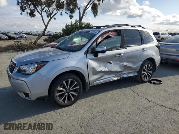 2017 Subaru Forester Touring с VIN JF2SJGWC3HH584750, выставлен на аукционе Copart как лот 54520155 с пробегом 96 839 миль миль и Списание • Salvage title. История ставок и продаж доступна на DreamBid. Изображение 1.