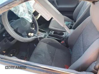 2004 Isuzu Rodeo S with VIN 4S2DM58W144316571, listed as a Copart auction lot 72086554 with Not Provided miles and Salvage Title. Bid and sale history available at DreamBid. Image 7.