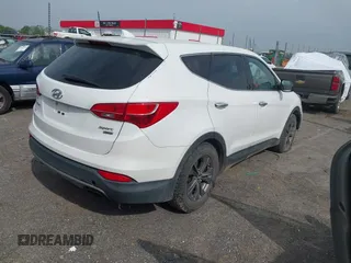 2014 Hyundai Santa Fe z VIN 5XYZTDLB1EG197765, wystawiony jako IAAI lot #41999374 z przebiegiem 172 430 mil mil oraz . Historia ofert i sprzedaży dostępna na DreamBid. Obrazek 4.