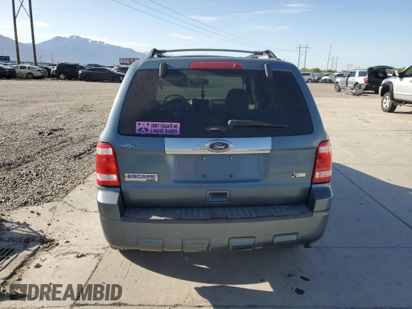 2012 Ford Escape Limited z VIN 1FMCU9EG5CKA16291, wystawiony jako Copart lot #58527415 z przebiegiem 173 637 mil mil oraz Szkoda całkowita • Salvage title. Historia ofert i sprzedaży dostępna na DreamBid. Obrazek 6.