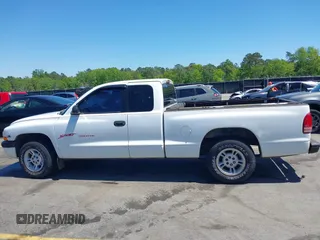 1999 Dodge Dakota SLT z VIN 1B7GL22X0XS193423, wystawiony jako IAAI lot #42053562 z przebiegiem 209 802 mil mil oraz . Historia ofert i sprzedaży dostępna na DreamBid. Obrazek 14.
