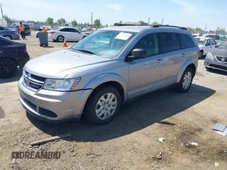 2016 Dodge Journey SE with VIN 3C4PDCAB1GT230387, listed as a IAAI auction lot 42106842 with 157,299 mi miles. Bid and sale history available at carsss.com. Image 2.
