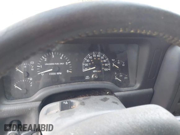 1999 Jeep Cherokee Sport z VIN 1J4FF68S0XL663735, wystawiony jako IAAI lot #42463562 z przebiegiem Nie podano mil oraz . Historia ofert i sprzedaży dostępna na DreamBid. Obrazek 7.