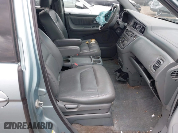 2004 Honda Odyssey EX-L with VIN 5FNRL18064B060817, listed as a IAAI auction lot 42032796 with 200,999 mi miles and . Bid and sale history available at DreamBid. Image 5.