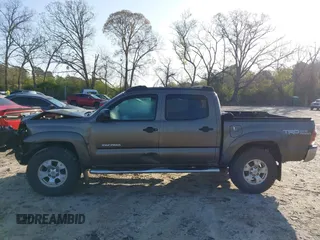 2014 Toyota Tacoma with VIN 3TMLU4EN3EM163162, listed as a IAAI auction lot 41930392 with 167,368 mi miles and . Bid and sale history available at DreamBid. Image 15.