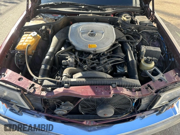 1986 Mercedes-Benz 560 with VIN WDBCA45D2GA206016, listed as a Copart auction lot 54577205 with 205,332 mi miles and Clean Title. Bid and sale history available at DreamBid. Image 7.