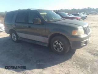 2004 Ford Expedition XLT with VIN 1FMPU16W64LA01397, listed as a IAAI auction lot 41494738 with 214,192 mi miles. Bid and sale history available at carsss.com. Image 1.