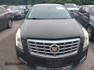 2014 Cadillac XTS z VIN 2G61L5S32E9326141, wystawiony jako IAAI lot #42300854 z przebiegiem 200 284 mil mil oraz . Historia ofert i sprzedaży dostępna na DreamBid. Obrazek 12.