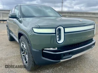 2023 Rivian R1S Launch Edition with VIN 7PDSGABL2PN003733, listed as a Copart auction lot 56033315 with 9,996 mi miles and Salvage Title. Bid and sale history available at carsss.com. Image 1.