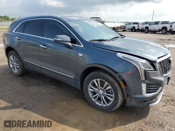 2021 Cadillac XT5 FWD Premium Luxury with VIN 1GYKNCRSXMZ118083, listed as a Copart auction lot 54703225 with 45,973 mi miles and Salvage Title. Bid and sale history available at carsss.com. Image 4.