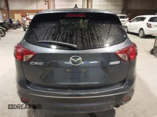 2013 Mazda CX-5 Grand Touring with VIN JM3KE2DE3D0128449, listed as a IAAI auction lot 41161558 with 108,618 mi miles. Bid and sale history available at carsss.com. Image 16.