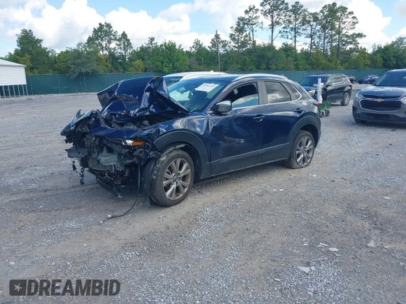 2022 Mazda CX-30 S Select with VIN 3MVDMBBL6NM448268, listed as a IAAI auction lot 42242290 with Not provided miles and . Bid and sale history available at DreamBid. Image 18.