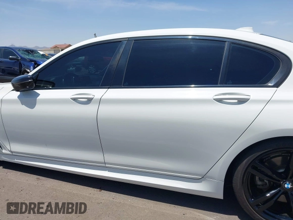 2016 BMW 7 Series 740i с VIN WBA7E2C50GG504050, выставлен на аукционе IAAI как лот 42498517 с пробегом 79 427 миль миль и . История ставок и продаж доступна на DreamBid. Изображение 14.