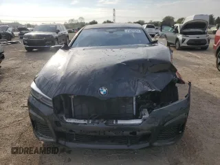 2020 BMW 7 Series with VIN WBA7U6C05LBM63050, listed as a Copart auction lot 71823944 with Not provided miles and Salvage title. Bid and sale history available at DreamBid. Image 5.