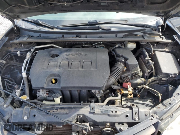 2016 Toyota Corolla L z VIN 5YFBURHE5GP390658, wystawiony jako Copart lot #56589705 z przebiegiem 125 121 mil mil oraz Szkoda całkowita • Salvage title. Historia ofert i sprzedaży dostępna na DreamBid. Obrazek 11.
