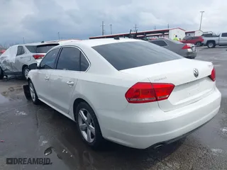 2013 Volkswagen Passat SE with VIN 1VWBP7A39DC070202, listed as a IAAI auction lot 41555860 with 149,091 mi miles. Bid and sale history available at carsss.com. Image 3.