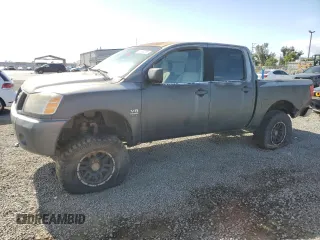 2004 Nissan Titan LE z VIN 1N6AA07B64N573368, wystawiony jako Copart lot #53864055 z przebiegiem Nie podano mil oraz Czysty tytuł • Clean title. Historia ofert i sprzedaży dostępna na DreamBid. Obrazek 1.