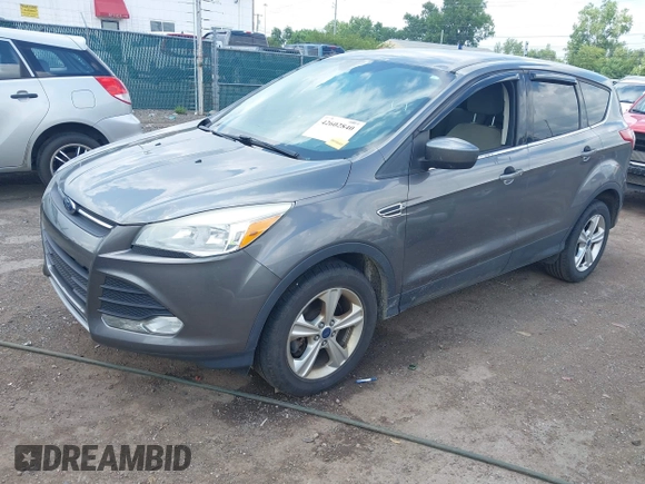 2013 Ford Escape SE with VIN 1FMCU9G95DUC01185, listed as a IAAI auction lot 42602840 with 140,697 mi miles and . Bid and sale history available at DreamBid. Image 17.