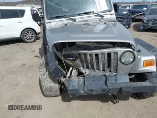 2002 Jeep Wrangler X with VIN 1J4FA39S82P707610, listed as a IAAI auction lot 41709953 with 1 mi miles. Bid and sale history available at carsss.com. Image 6.