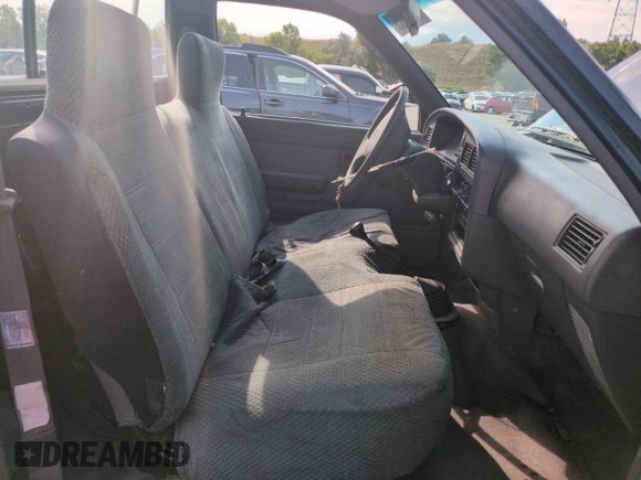 1994 Toyota Pickup DX with VIN JT4RN81PXR5174113, listed as a Copart auction lot 64211905 with 209,694 mi miles and Salvage title. Bid and sale history available at DreamBid. Image 7.