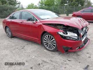 2017 Lincoln MKZ Select z VIN 3LN6L5C9XHR651135, wystawiony jako IAAI lot #42466836 z przebiegiem 136 477 mil mil oraz . Historia ofert i sprzedaży dostępna na DreamBid. Obrazek 1.