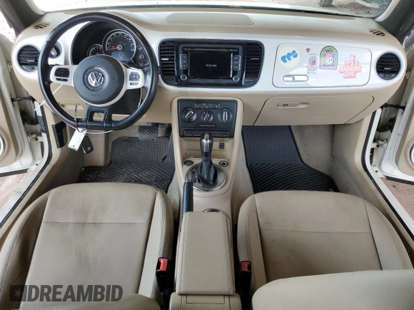 2013 Volkswagen Beetle 2.5L w/Sound/Nav z VIN 3VW5P7AT7DM811992, wystawiony jako Copart lot #59526355 z przebiegiem 102 542 mil mil oraz Szkoda całkowita • Salvage title. Historia ofert i sprzedaży dostępna na DreamBid. Obrazek 8.