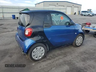 2016 Smart fortwo Passion z VIN WMEFJ5DA0GK076339, wystawiony jako Copart lot #68891564 z przebiegiem Nie podano mil oraz Szkoda całkowita • Salvage title. Historia ofert i sprzedaży dostępna na DreamBid. Obrazek 3.