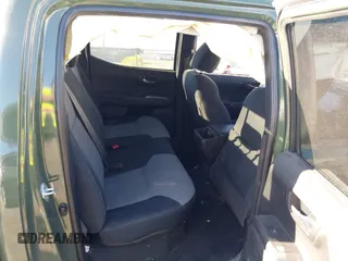 2021 Toyota Tacoma SR with VIN 3TYCZ5AN2MT039450, listed as a IAAI auction lot 40457613 with 54,176 mi miles and . Bid and sale history available at DreamBid. Image 8.