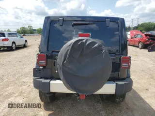 2012 Jeep Wrangler Unlimited Sahara z VIN 1C4HJWEG6CL141988, wystawiony jako Copart lot #61631115 z przebiegiem 140 401 mil mil oraz Szkoda całkowita • Salvage title. Historia ofert i sprzedaży dostępna na DreamBid. Obrazek 6.