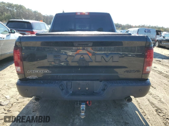 2015 Ram 1500 Rebel z VIN 1C6RR7YT7FS771791, wystawiony jako Copart lot #49873094 z przebiegiem 119 875 mil mil oraz Szkoda całkowita • Salvage title. Historia ofert i sprzedaży dostępna na DreamBid. Obrazek 6.