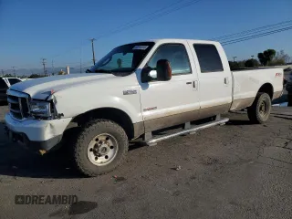 2004 Ford Super Duty F-250 XL with VIN 1FTNW21P94EB80311, listed as a Copart auction lot 43791515 with 254,082 mi miles and Salvage Title. Bid and sale history available at carsss.com. Image 1.
